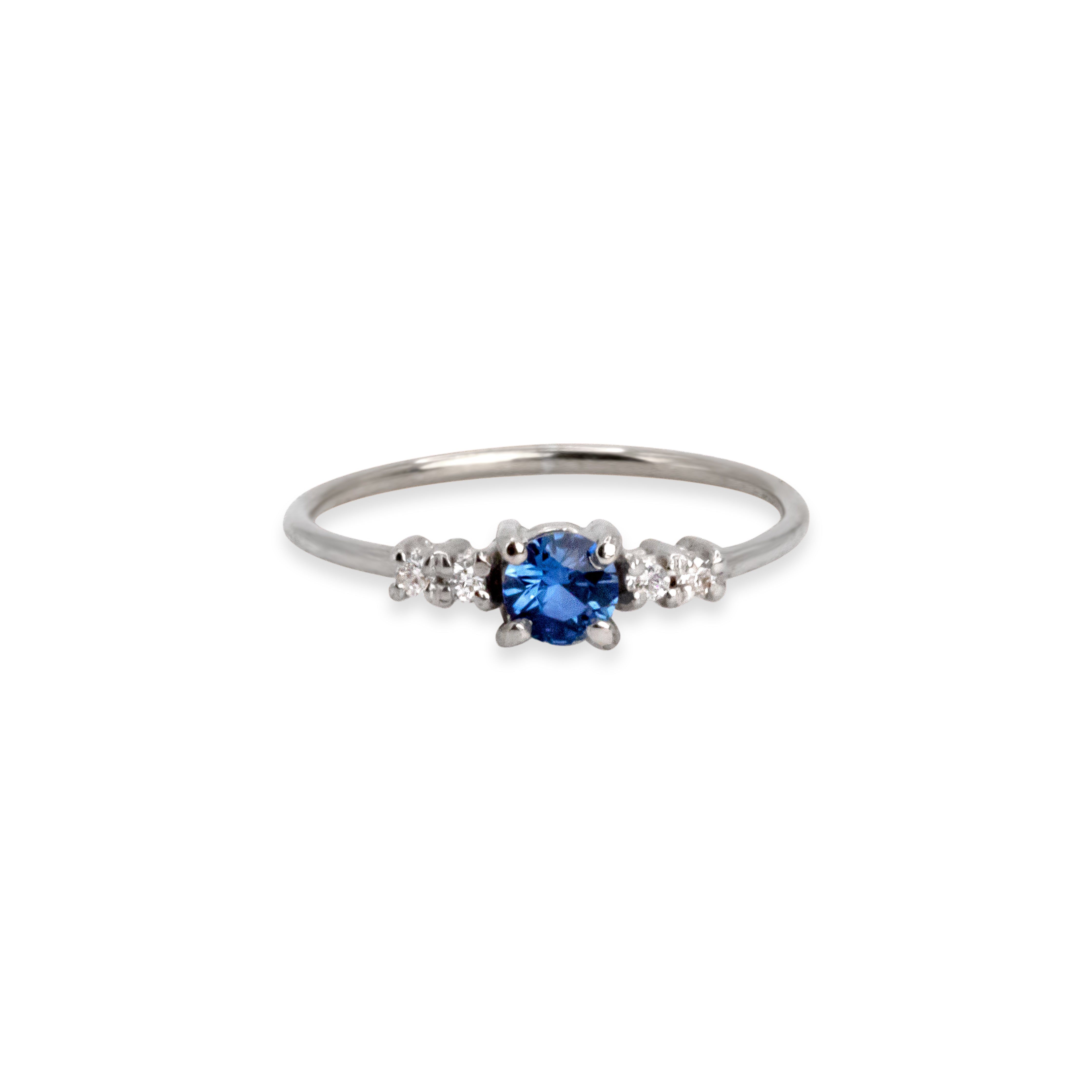 Anillo zafiro redondo con cuatro diamantes Oro 18kt