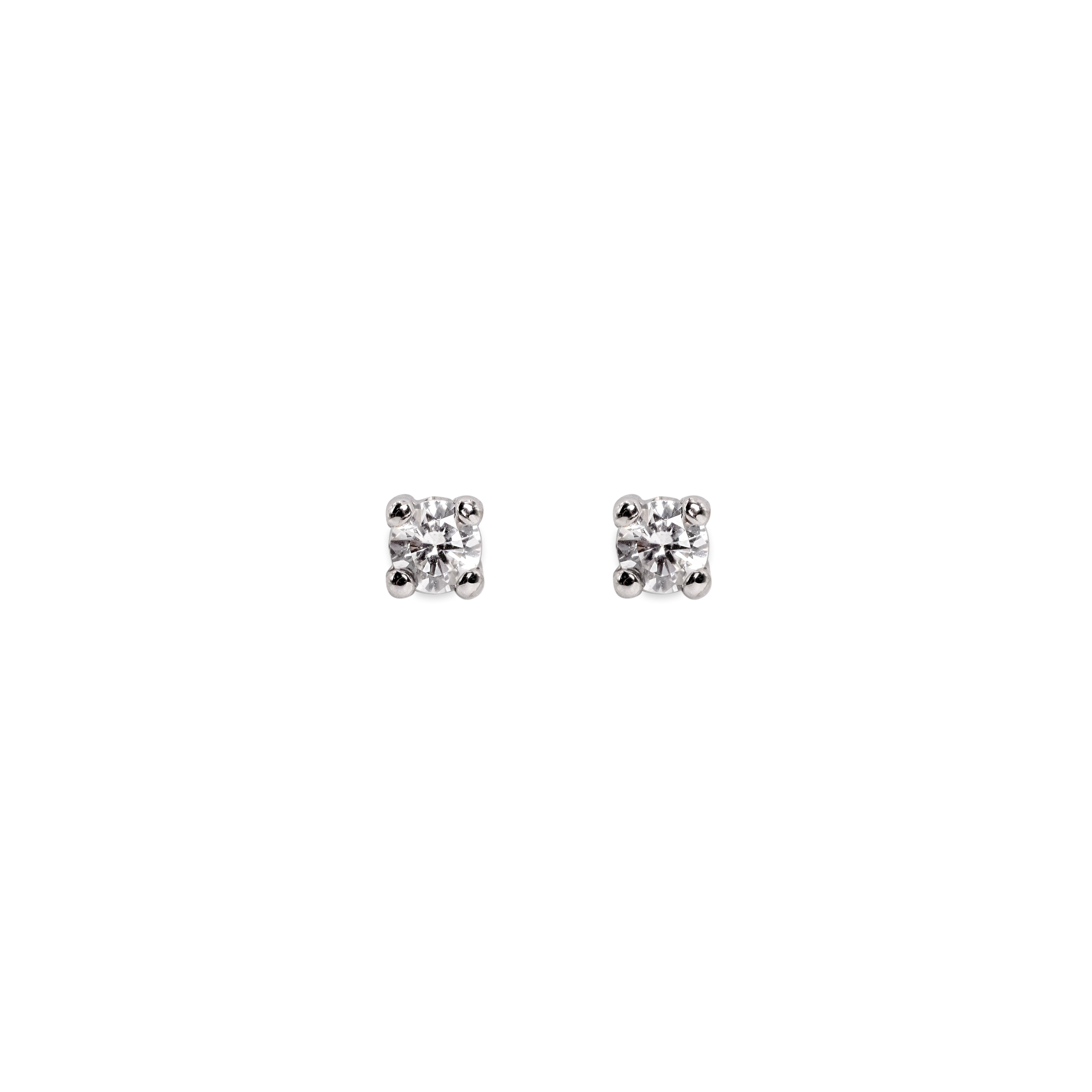 Pendientes solitario 3mm oro blanco 18kts