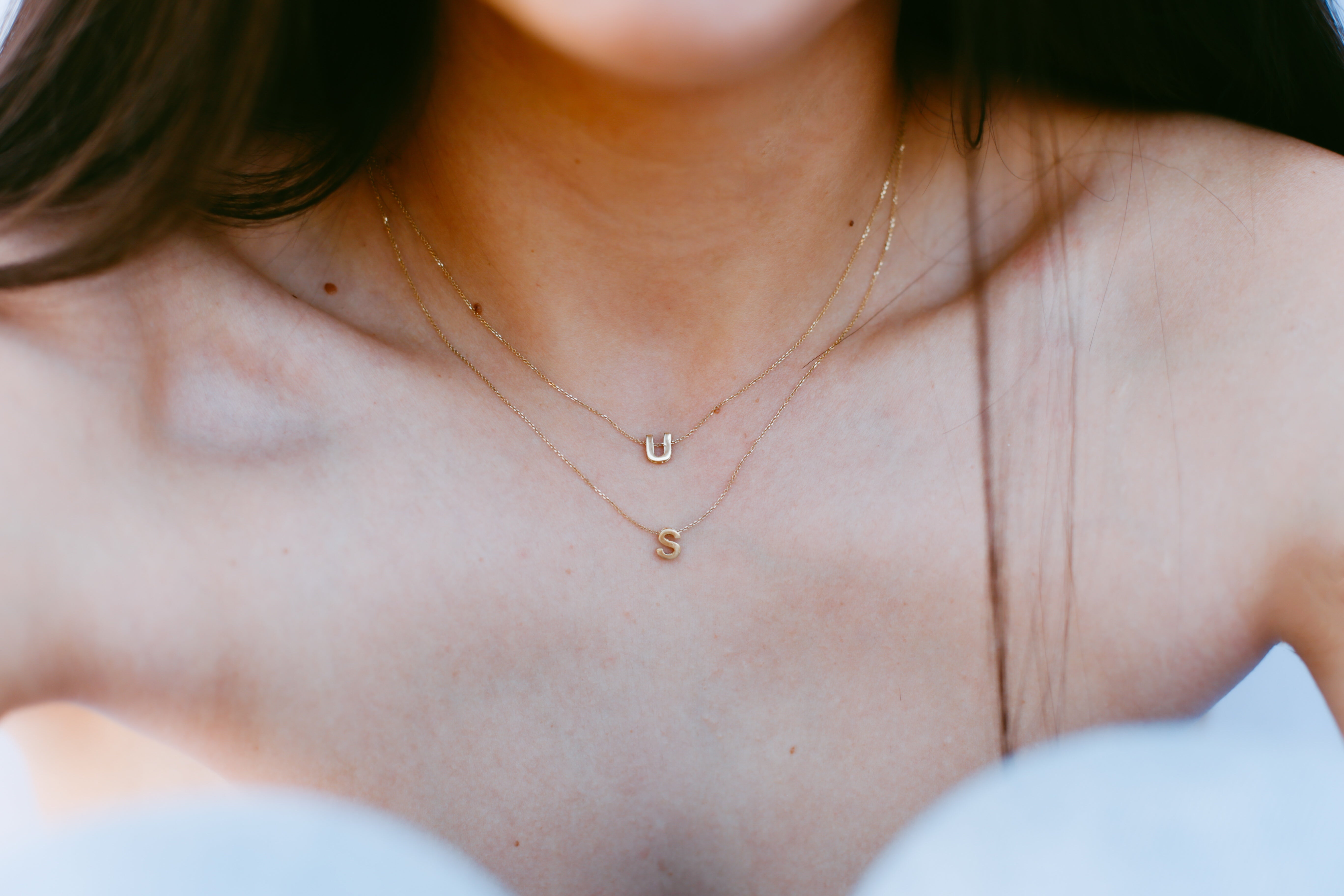 Collar doble cadena dos iniciales Oro 18 Kt