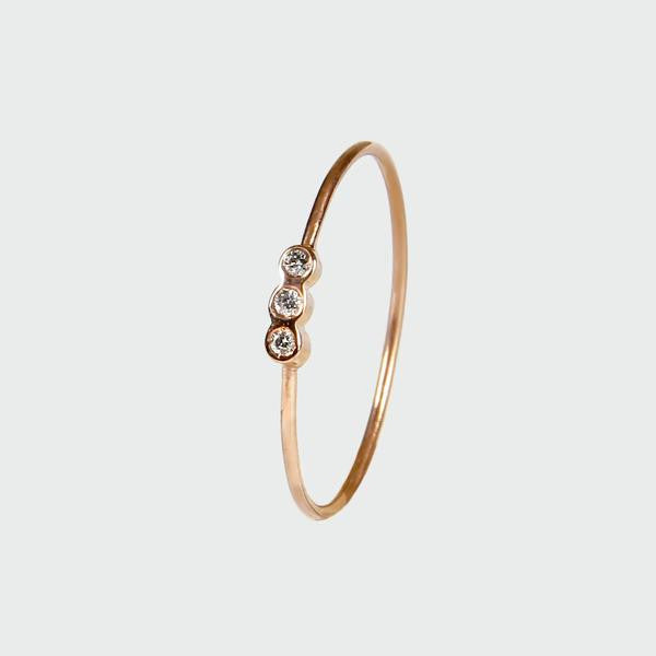 Anillo con tres diamantes