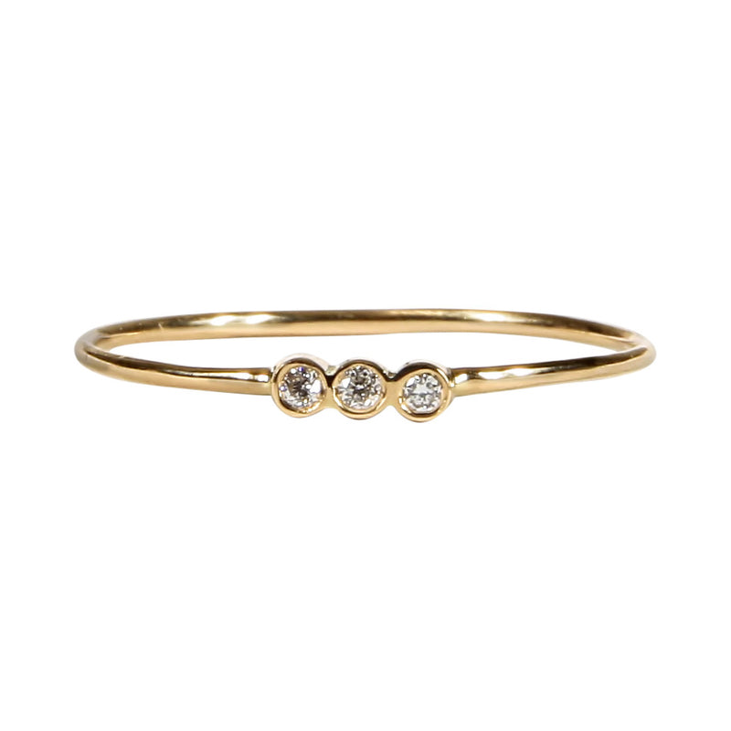 Anillo Fino con Tres Diamantes en Oro Amarillo 18 K